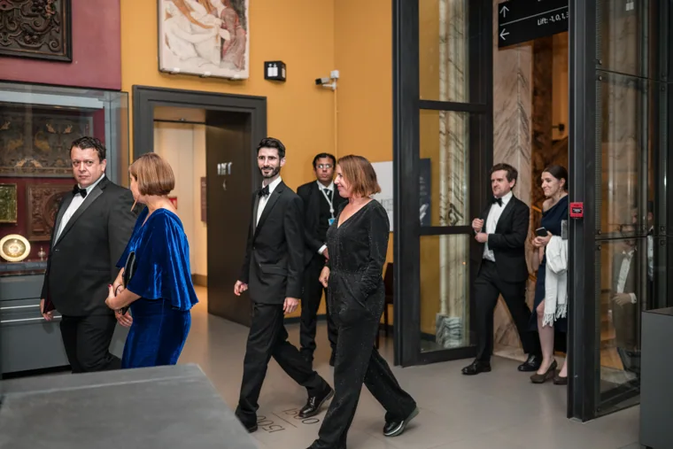 Guests walking into a museum gallery at the Chambers UK Awards winter edition.