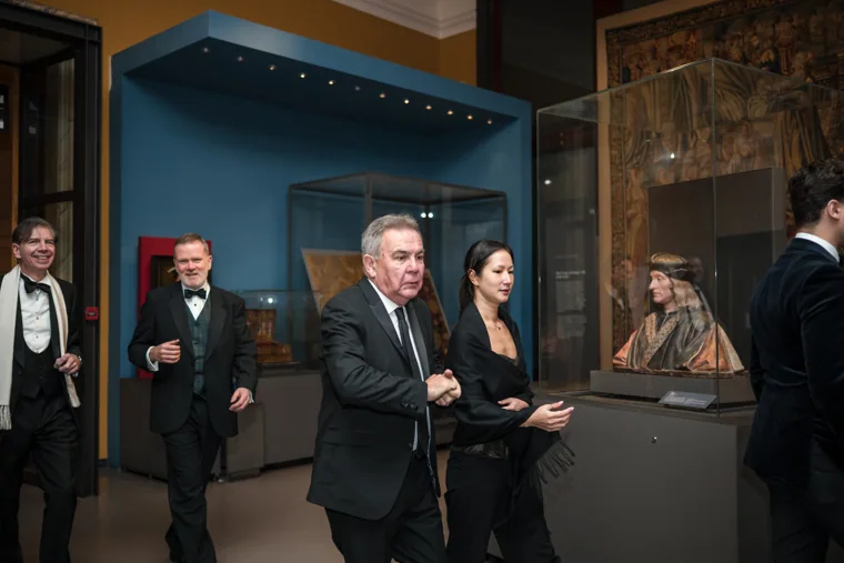 Guests walking together through the gallery at the Chambers UK Awards winter edition.