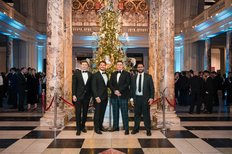 Men posing together at the awards reception at the Chambers UK Awards winter edition.