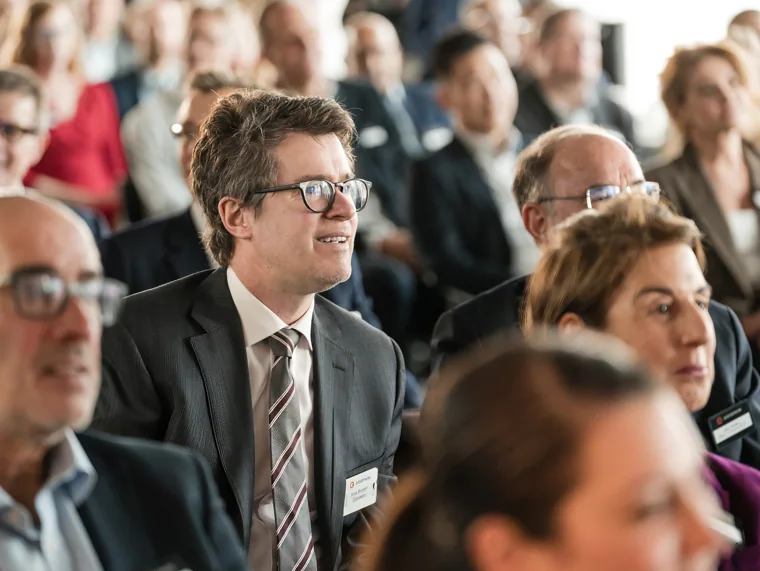Attendees listening during the Goodwin programme at the Goodwin networking event.