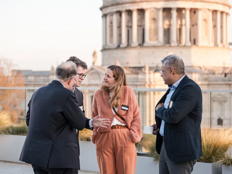 A terrace conversation with St Paul’s Cathedral in the background at the Goodwin networking event.