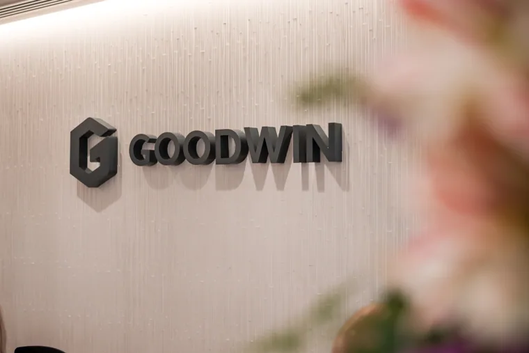 The Goodwin logo at the event venue at the Goodwin networking event.