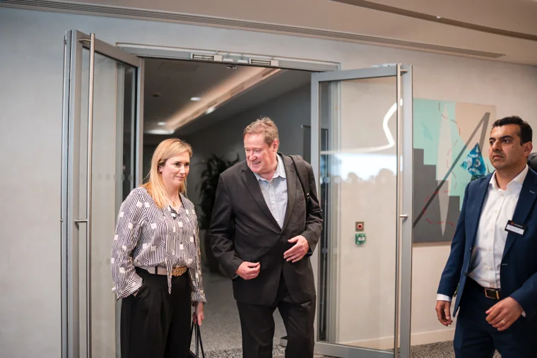 Guests walking into the event space at the Goodwin networking event.