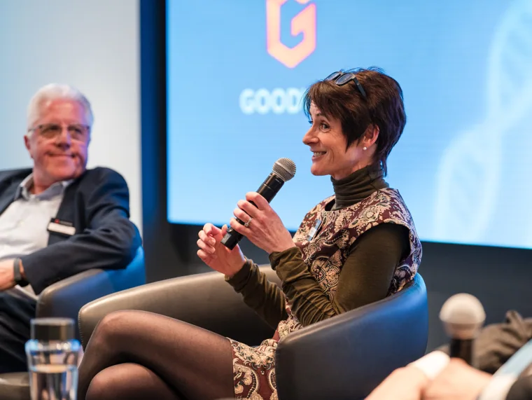 A panel speaker responding during a discussion at the Goodwin networking event.