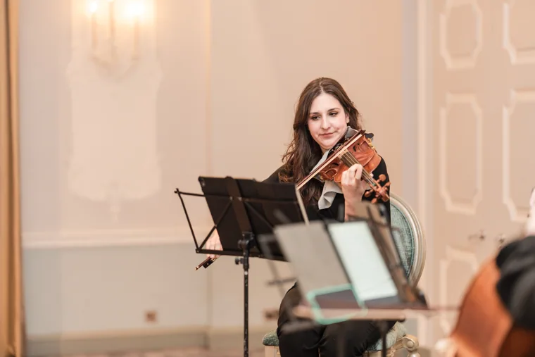 A violinist performing during the dinner at the S-OIL European customer dinner.
