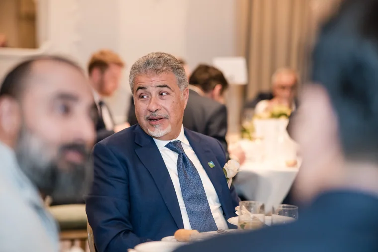 Guests talking during the meal at the S-OIL European customer dinner.