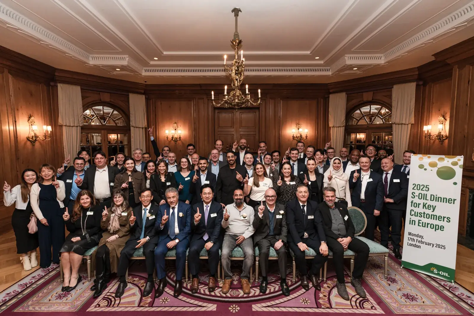 The full group posing at the European customer dinner at the S-OIL European customer dinner.